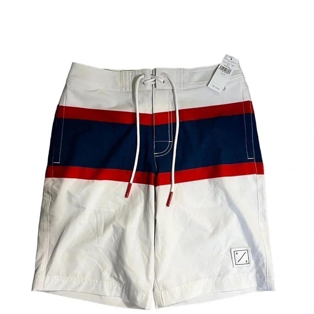 AE XS Board Shorts Brand new in white with blue and red accent colors